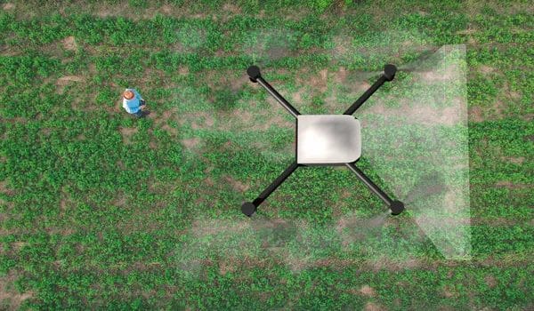 Unpeeling The Nutritional Benefits Of Organic And Regular Bananas 3 3. photo of a farmer using a drone to spray chemicals such as pesticides